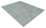 Distressed finished 8x10 Gray and Silver Low Pile wool Rug