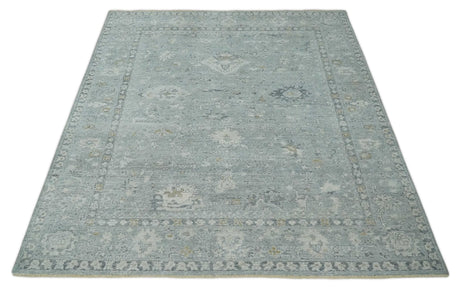 Distressed finished 8x10 Gray and Silver Low Pile wool Rug