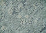 Distressed finished 8x10 Gray and Silver Low Pile wool Rug