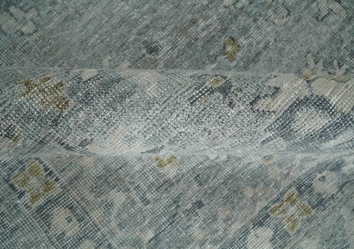 Distressed finished 8x10 Gray and Silver Low Pile wool Rug