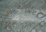 Distressed finished 8x10 Gray and Silver Low Pile wool Rug