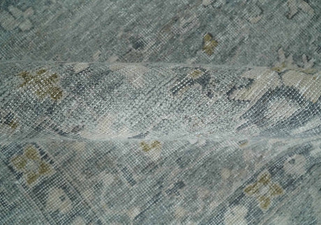 Distressed finished 8x10 Gray and Silver Low Pile wool Rug