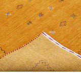 Gold Tribal Center Medallion Hand Loomed Wool Area Rug