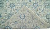Hand Knotted Traditional Ivory and Blue Oxidized Textured Low Pile Wool Rug