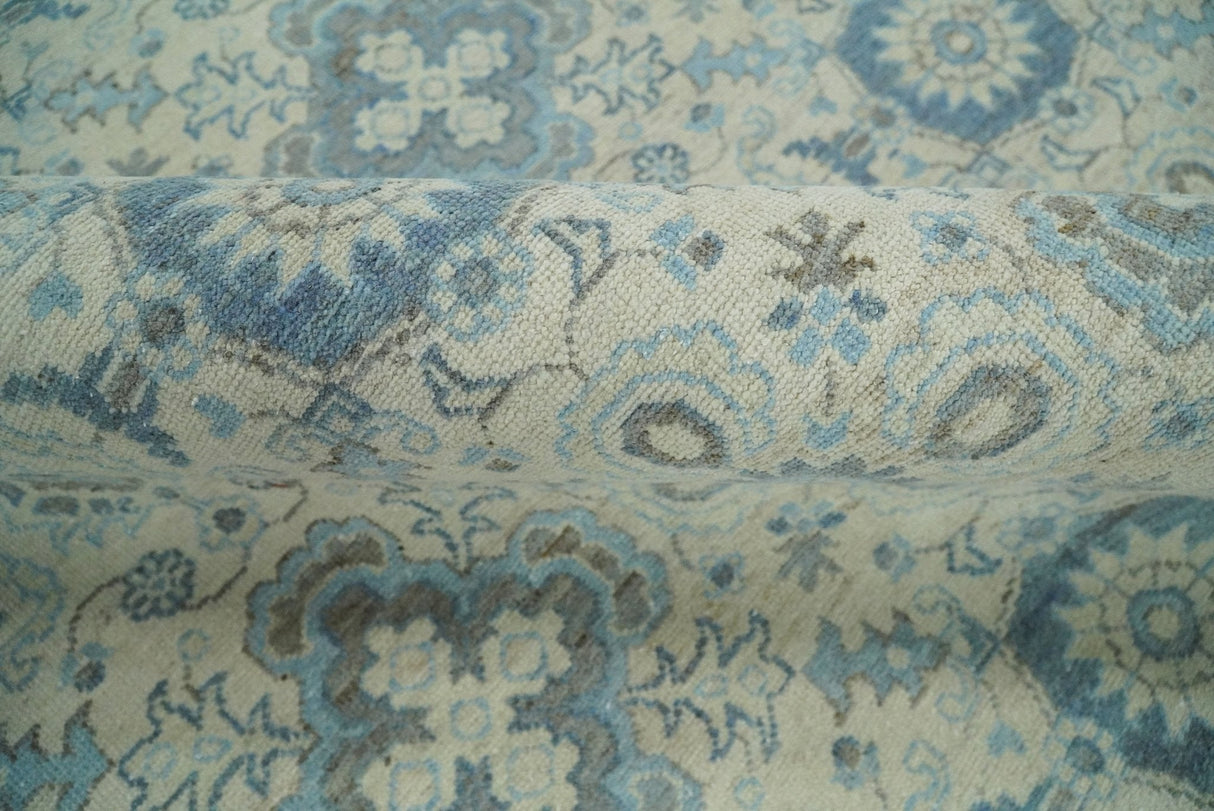 Hand Knotted Traditional Ivory and Blue Oxidized Textured Low Pile Wool Rug