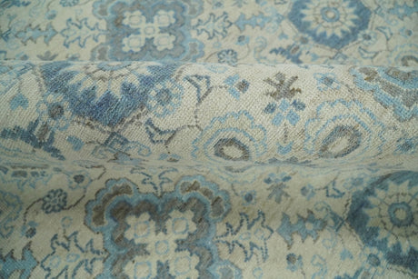 Hand Knotted Traditional Ivory and Blue Oxidized Textured Low Pile Wool Rug