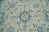 Hand Knotted Traditional Ivory and Blue Oxidized Textured Low Pile Wool Rug