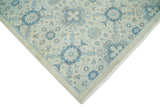 Hand Knotted Traditional Ivory and Blue Oxidized Textured Low Pile Wool Rug