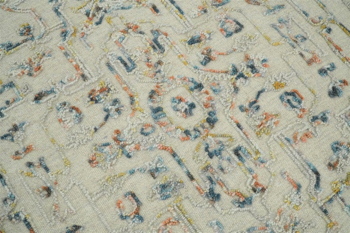 Hand Tufted 5x8 Beige and Blue Wool Textured Loop Area Rug