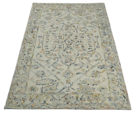 Hand Tufted 5x8 Beige and Blue Wool Textured Loop Area Rug