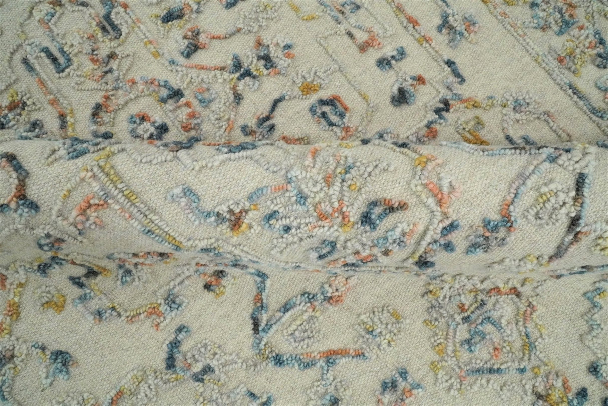 Hand Tufted 5x8 Beige and Blue Wool Textured Loop Area Rug