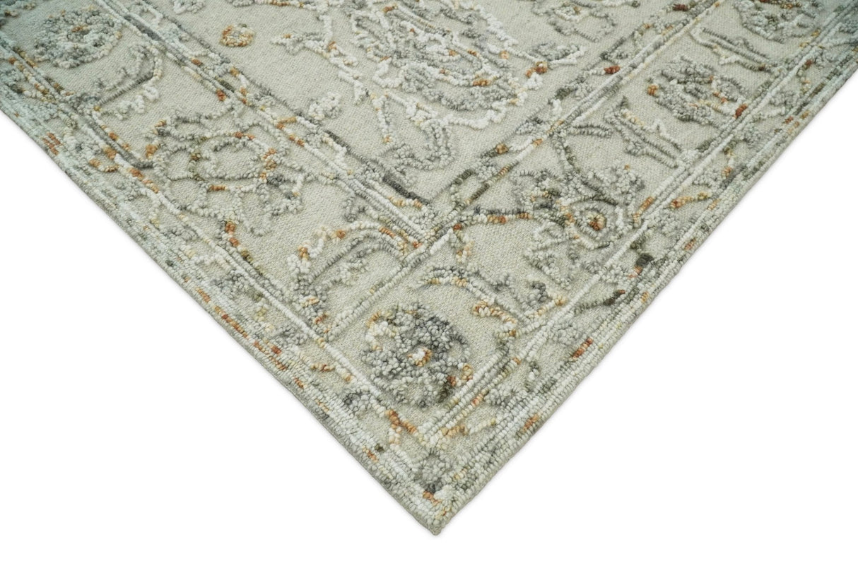 Hand Tufted Beige and Silver Wool Textured Loop 5x8 Area Rug