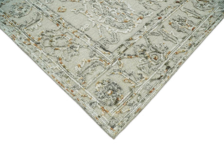 Hand Tufted Beige and Silver Wool Textured Loop 5x8 Area Rug