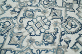 Hand Tufted Blue and Ivory Wool Textured Loop 5x8 Area Rug