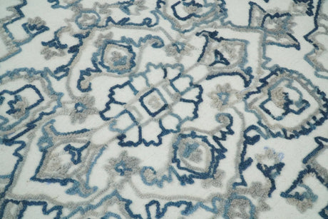 Hand Tufted Blue and Ivory Wool Textured Loop 5x8 Area Rug