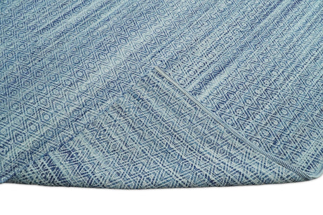 Handmade Boho Ivory and Blue Wool Blend Dhurrie Rug