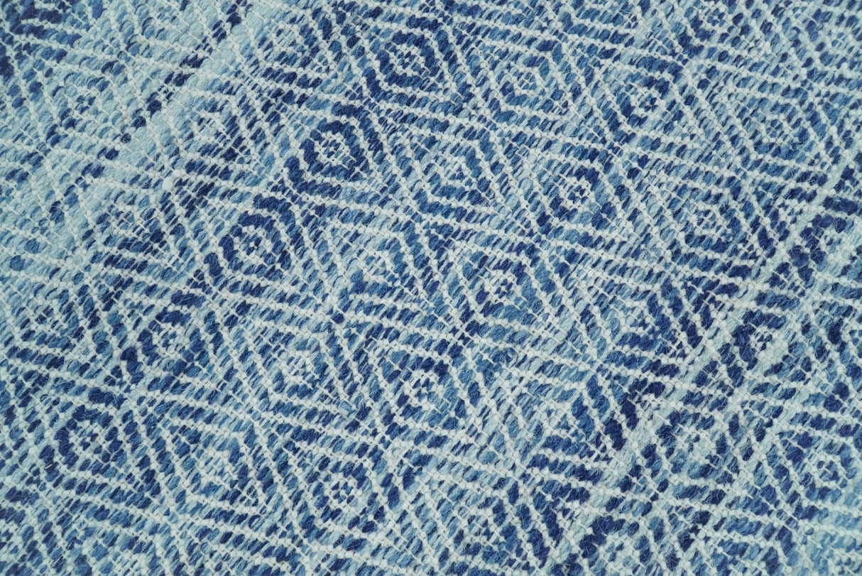Handmade Boho Ivory and Blue Wool Blend Dhurrie Rug
