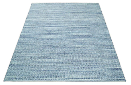 Handmade Boho Ivory and Blue Wool Blend Dhurrie Rug