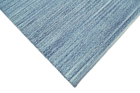 Handmade Boho Ivory and Blue Wool Blend Dhurrie Rug