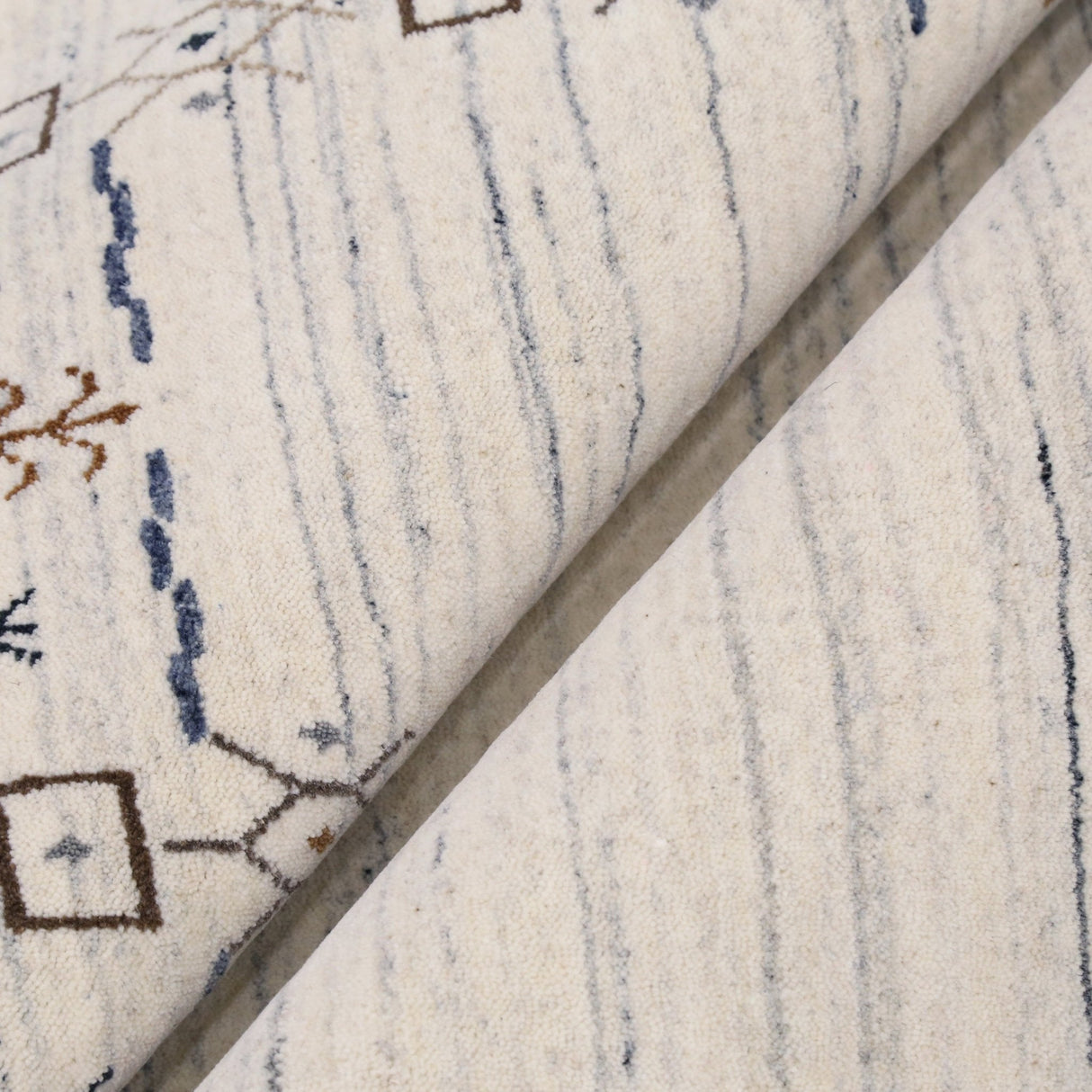 Ivory And Blue Tribal Border Design Hand Loomed Wool Area Rug
