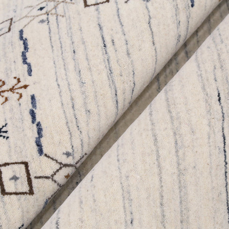 Ivory And Blue Tribal Border Design Hand Loomed Wool Area Rug