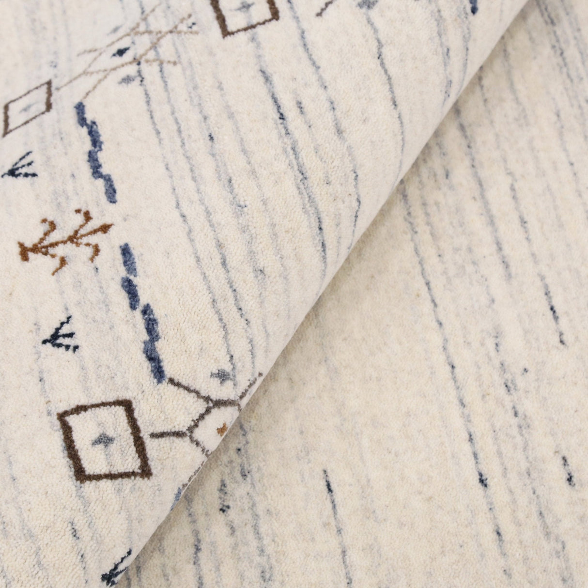 Ivory And Blue Tribal Border Design Hand Loomed Wool Area Rug