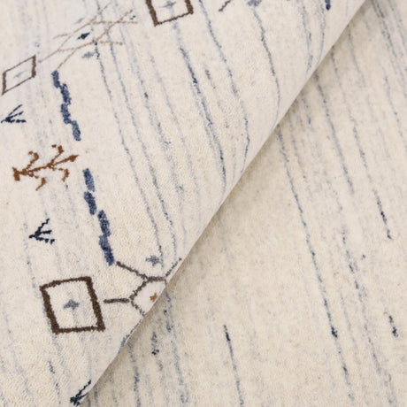 Ivory And Blue Tribal Border Design Hand Loomed Wool Area Rug