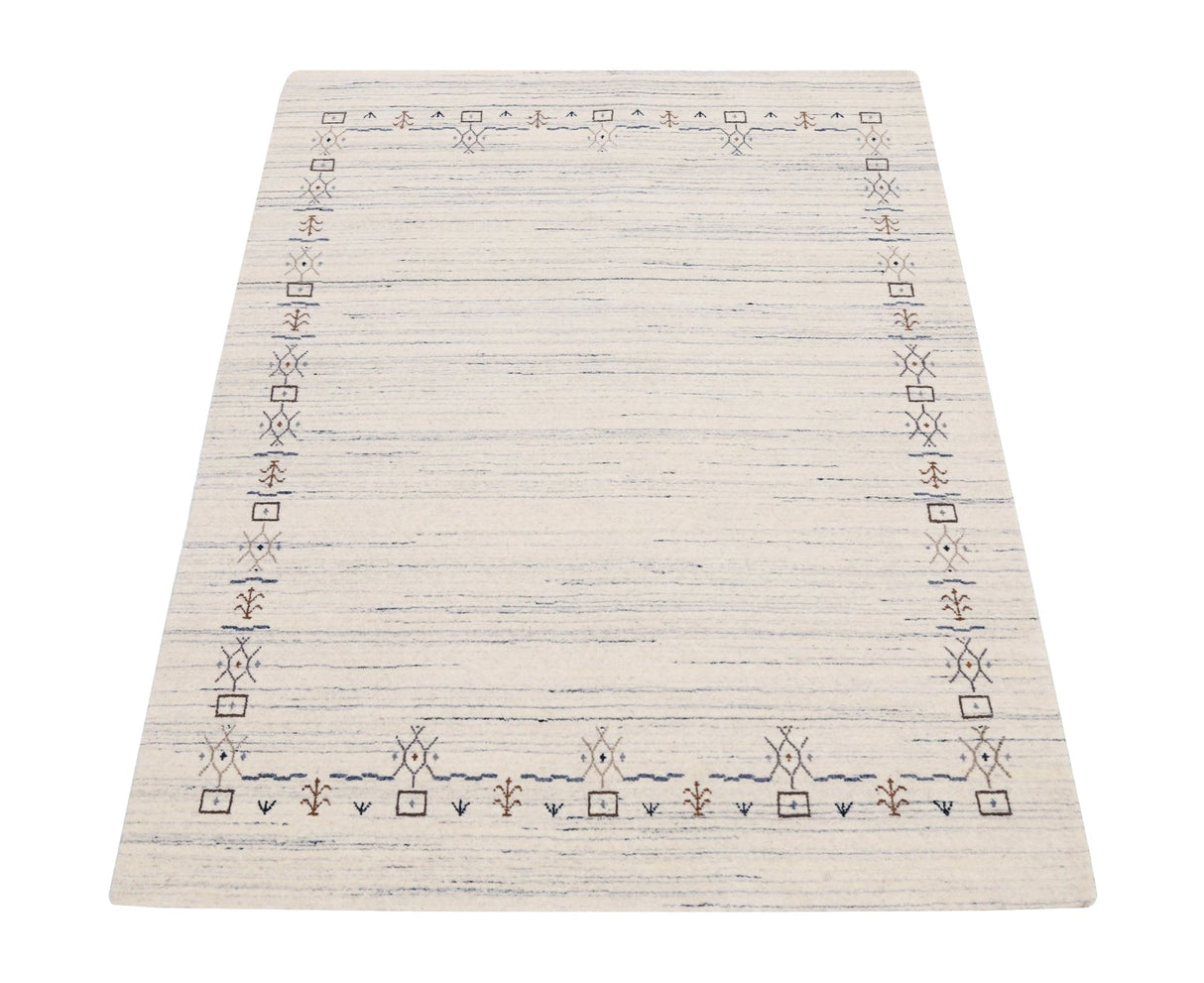 Ivory And Blue Tribal Border Design Hand Loomed Wool Area Rug