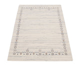 Ivory And Blue Tribal Border Design Hand Loomed Wool Area Rug