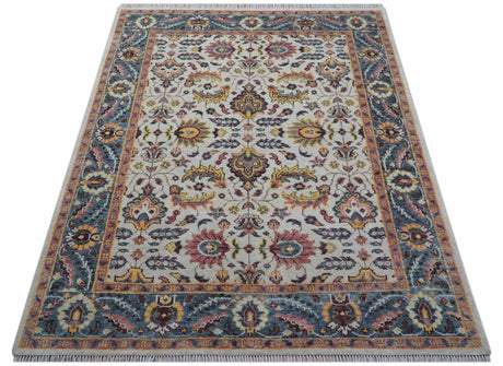 Kelly Turkish Design Ivory And Blue Hand Knotted Wool Rug