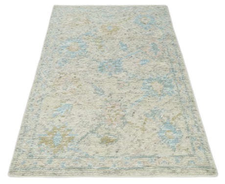 Modern Contemporary Ivory and Blue Hand Knotted Wool Rug