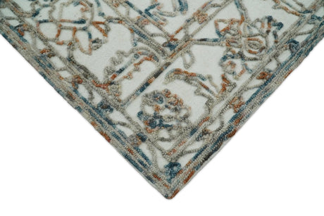 Modern Ivory And Blue Hand Tufted 5x8 Wool Textured Loop Area Rug