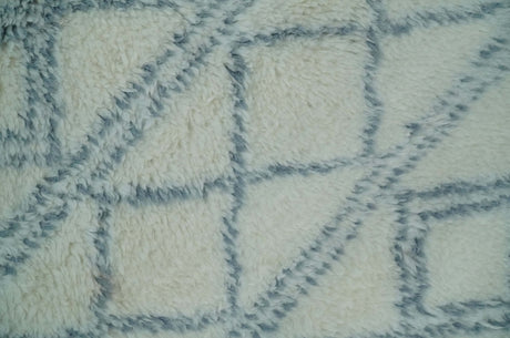 Modern Ivory and Blue Moroccan Hand Made Wool Area Rug