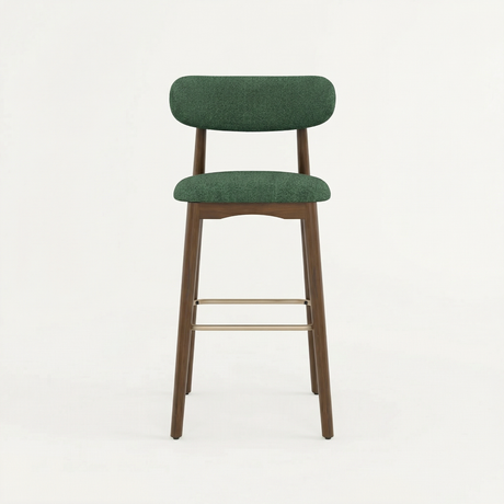 Norden Bar Stool with dark green upholstered seat and back, walnut wood frame, and brass footrest.