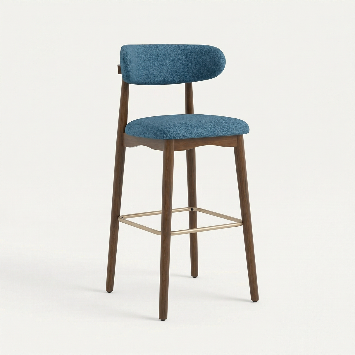 Norden Bar Stool in denim blue fabric with a dark wood frame and brass footrest.