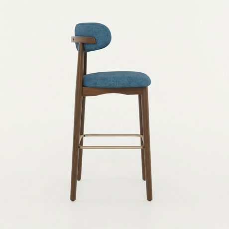 Norden Bar Stool with blue upholstered seat and back, dark wood frame, and brass footrest.