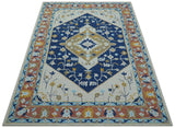 Ollie Traditional Blue And Ivory Hand Tufted Wool Rug