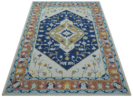 Ollie Traditional Blue And Ivory Hand Tufted Wool Rug