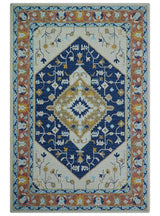 Ollie Traditional Blue And Ivory Hand Tufted Wool Rug