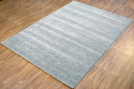Solid Blue and Silver Wool And Viscose 5x8 Area Rug