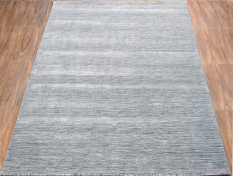 Solid Blue and Silver Wool And Viscose 5x8 Area Rug