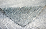 Solid Blue and Silver Wool And Viscose 5x8 Area Rug