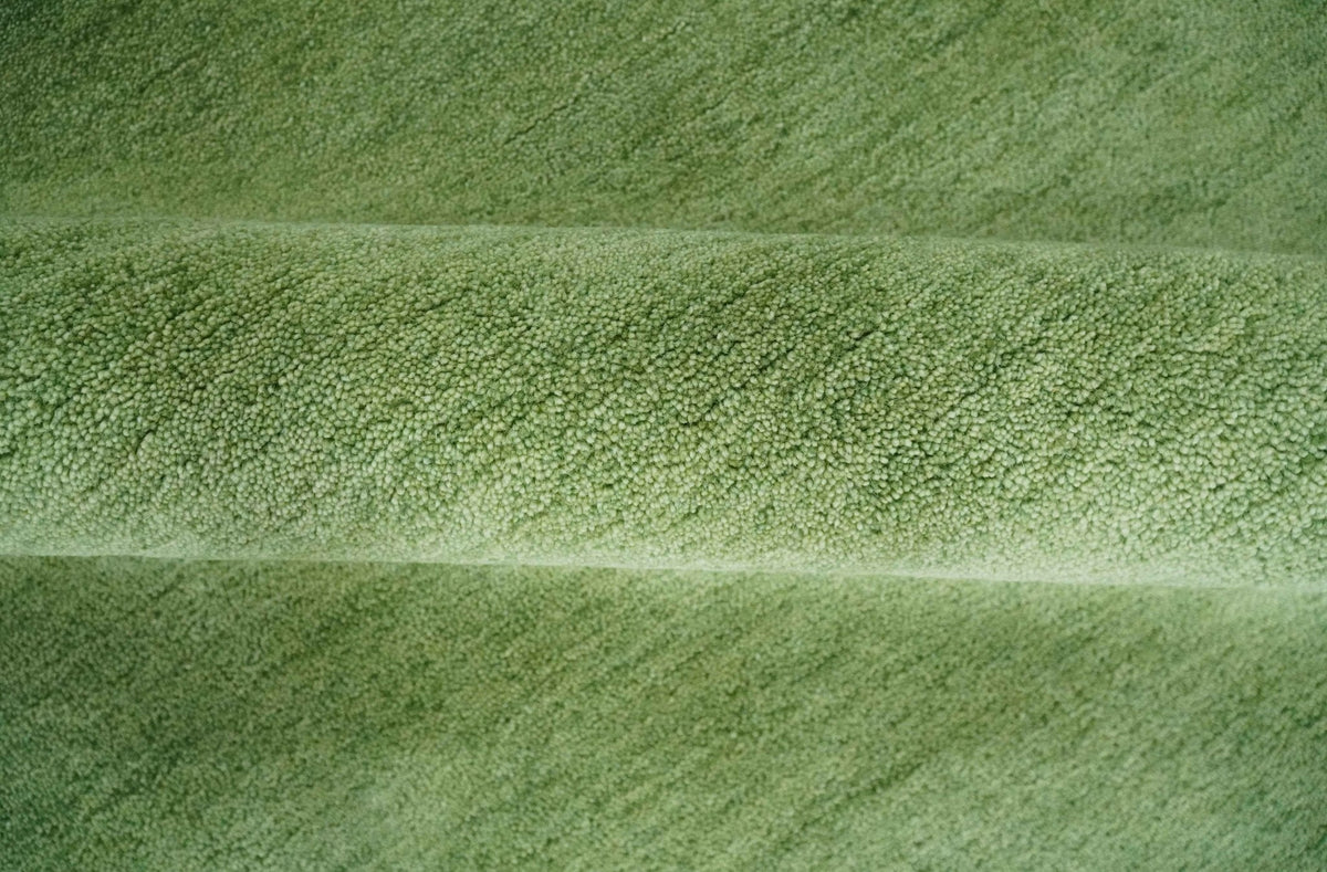 Solid Green Woolen Hand Tufted contemporary area Rug