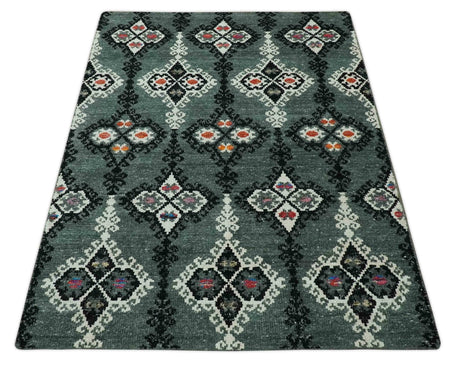 Traditional Ikat Design 5x7.6 Green, Black and Ivory Hand Knotted wool area rug