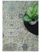 Vintage Style Ivory and Rust 8x10 Traditional Textured Low Pile Wool Rug